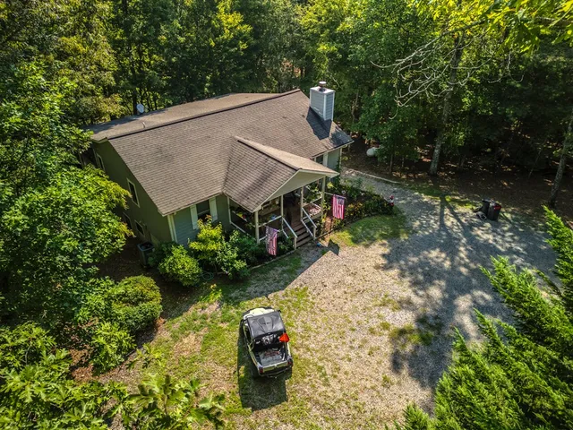 a view of backyard with green space