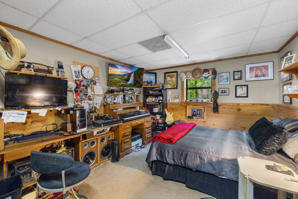 77 Chosen Ridge Morganton, GA 30560 - Photo 25 of 37 a living room with lots of furniture and a flat screen tv