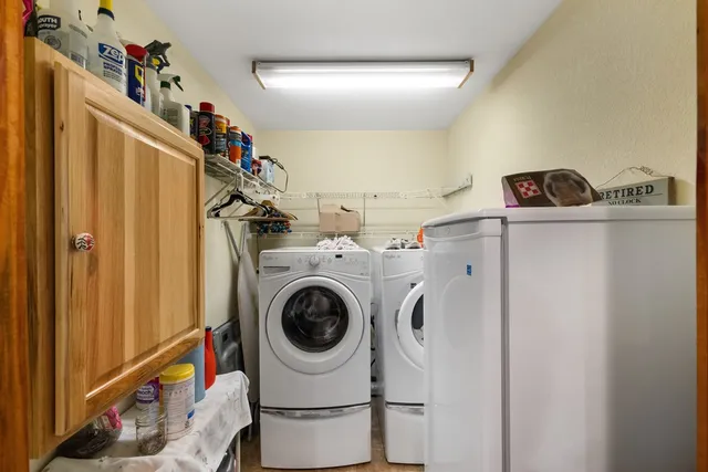 a utility room with dryer and washer