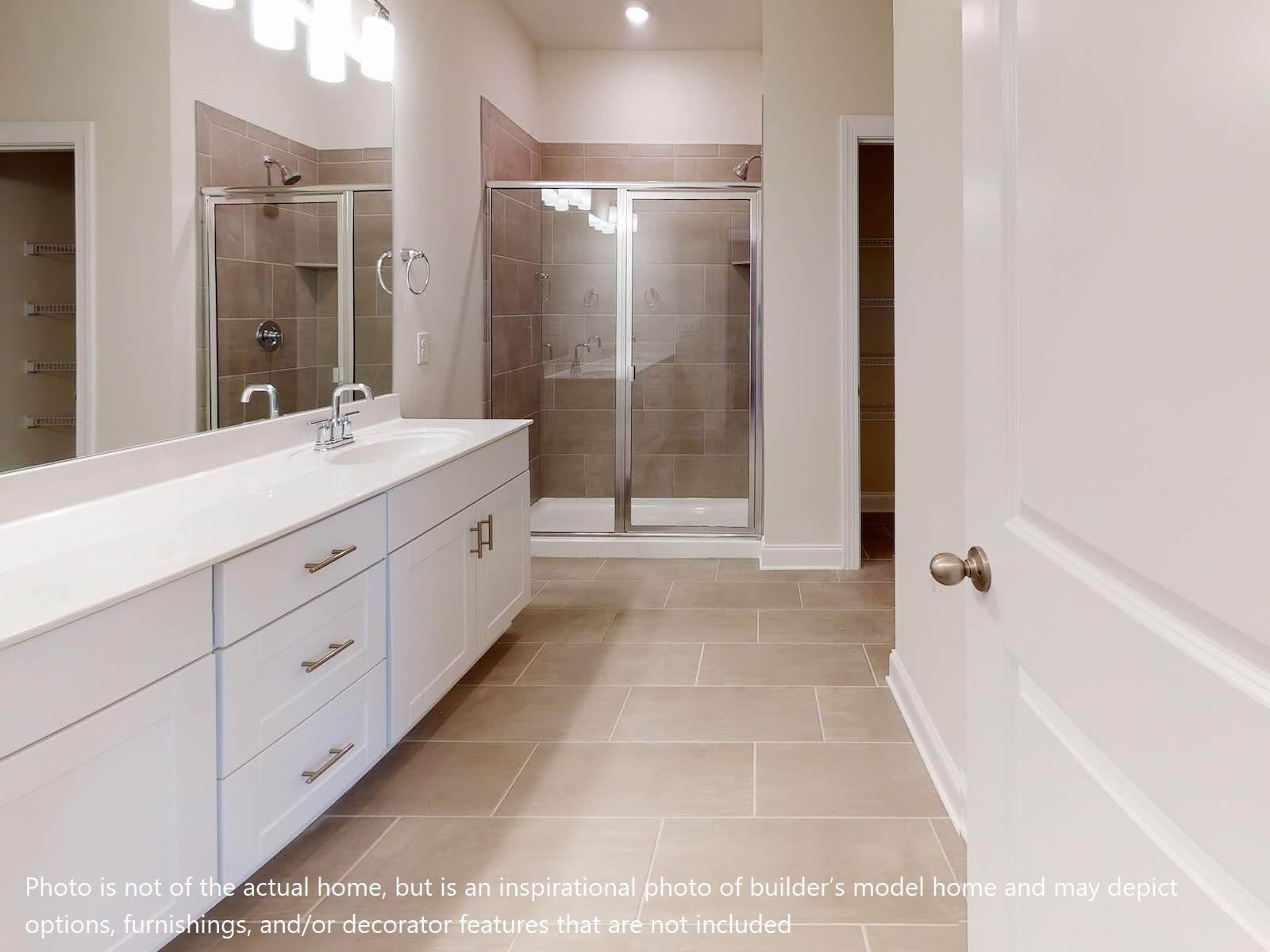 1106 Holland Ridge Way Lebanon, TN 37090 - Photo 19 of 19 a spacious bathroom with a mirror a shower and vanity