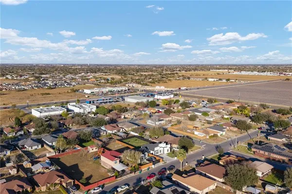 an outdoor space with lots of furniture and garden view