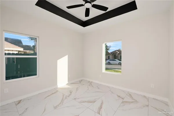 a view of an empty room and window