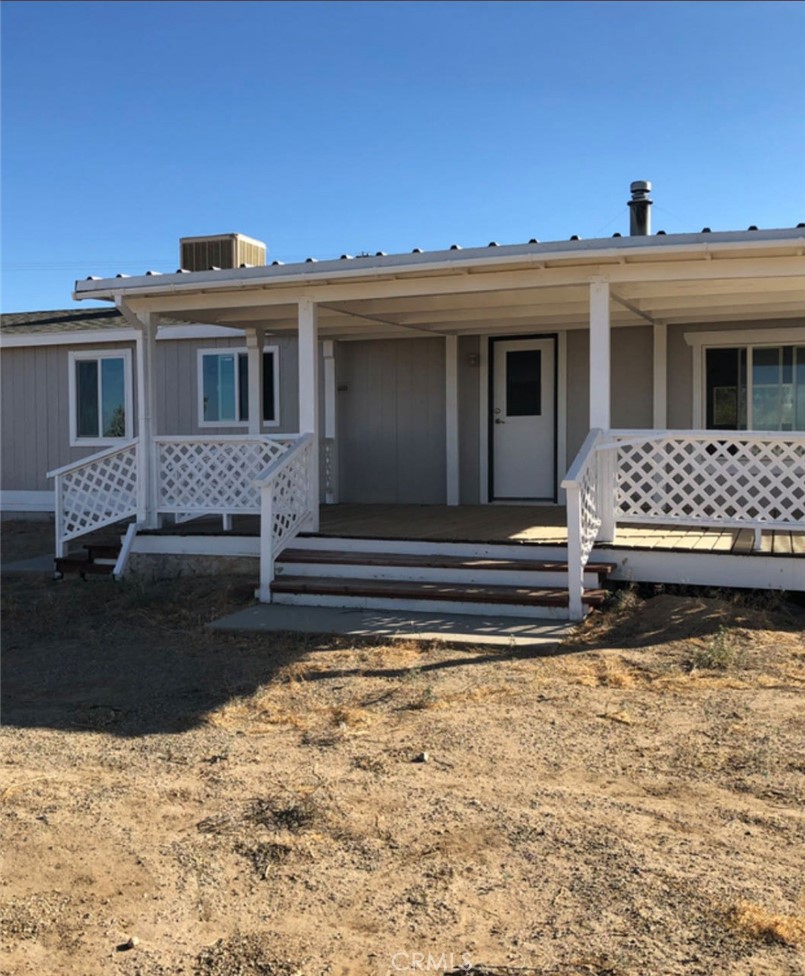 5680 Duncan Road Phelan, CA 92371 - Photo 1 of 1 a view of a house with a yard