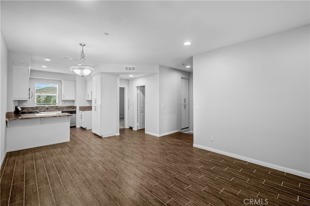 4617 Alekona Ct. Cypress, CA 90630 - Photo 14 of 35 a view of kitchen with wooden floor