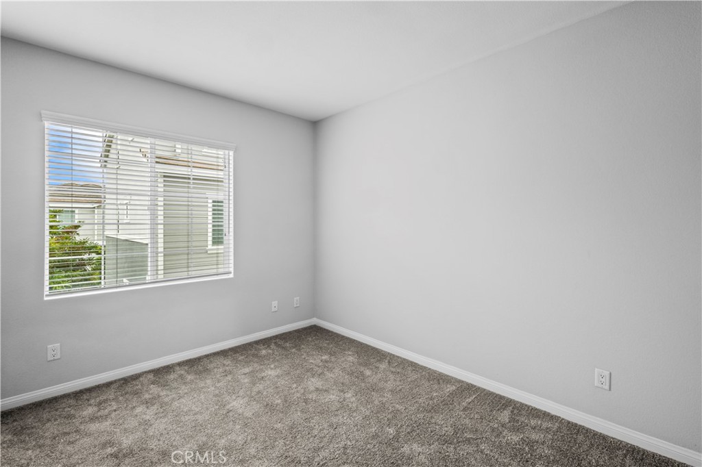 4617 Alekona Ct. Cypress, CA 90630 - Photo 19 of 35 an empty room with a window