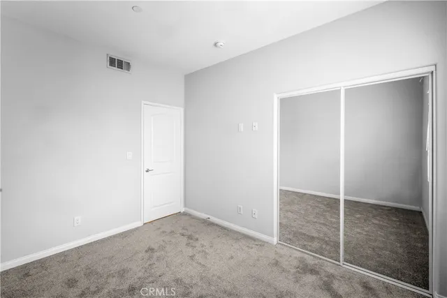 an empty room with closet