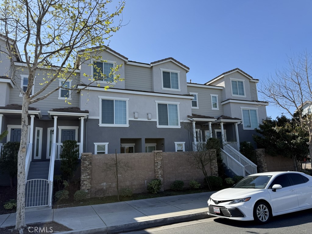 4617 Alekona Ct. Cypress, CA 90630 - Photo 2 of 35 a car parked in front of a white house