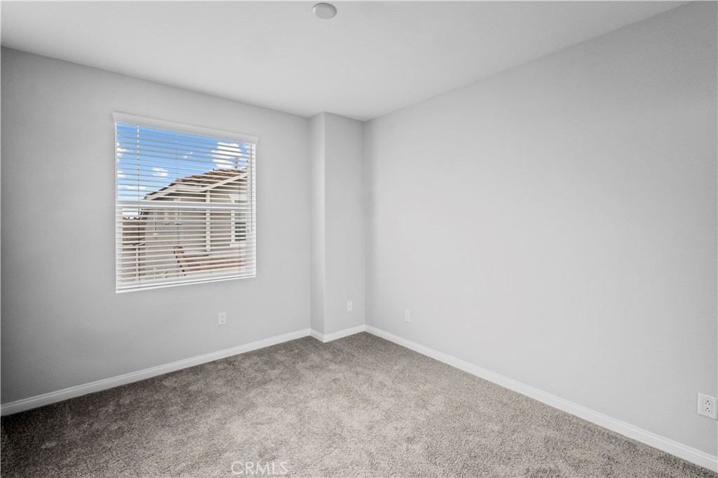 4617 Alekona Ct. Cypress, CA 90630 - Photo 28 of 35 an empty room with a window