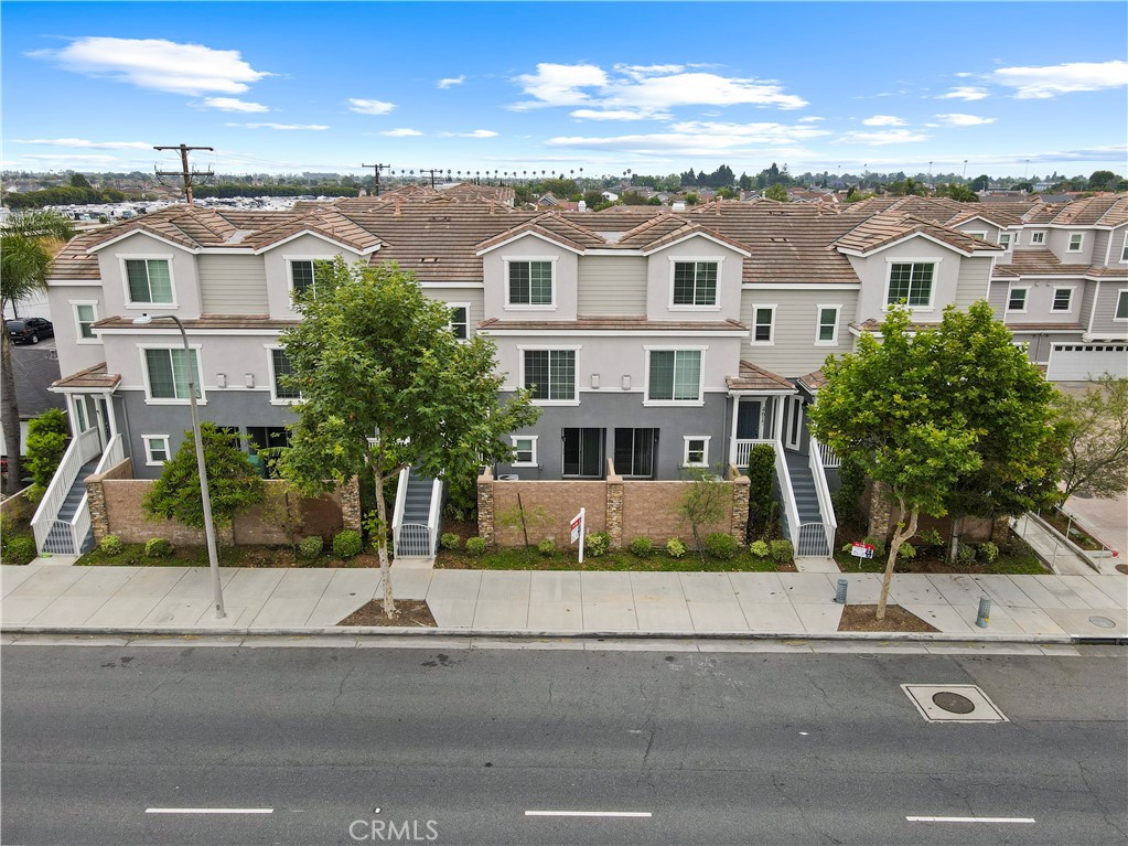 4617 Alekona Ct. Cypress, CA 90630 - Photo 32 of 35 front view of a house with a yard