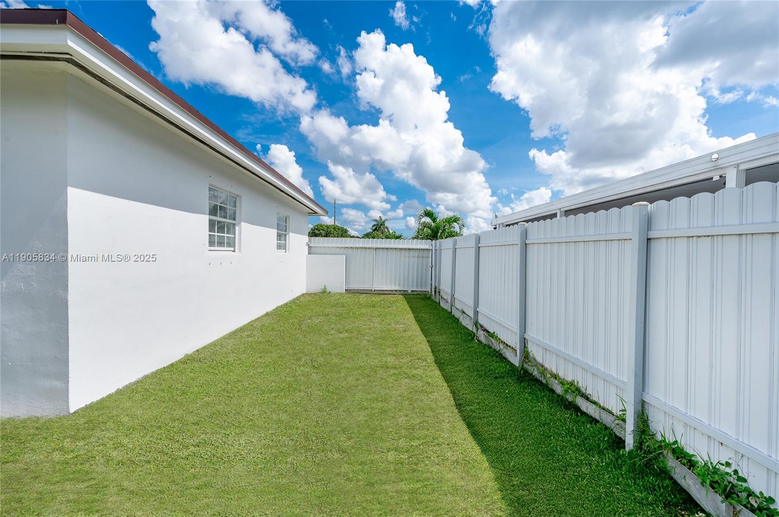 5420 Northwest 182nd Street Miami Gardens, FL 33055 - Photo 13 of 35 a view of a backyard