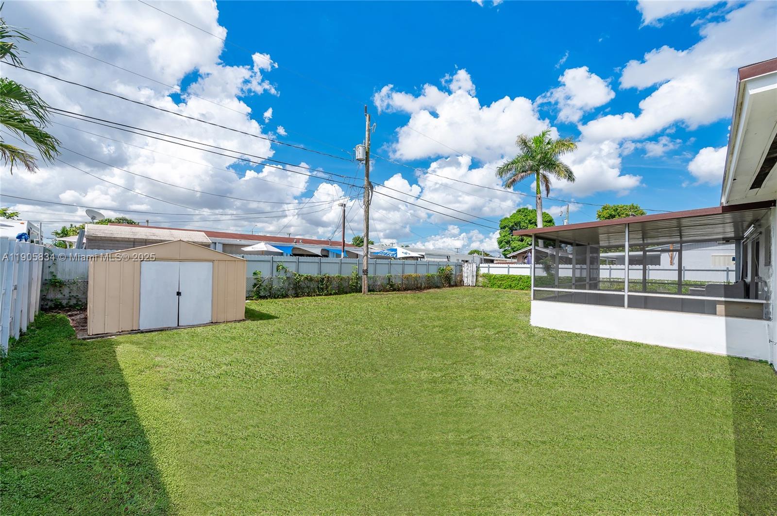 5420 Northwest 182nd Street Miami Gardens, FL 33055 - Photo 14 of 35 a view of a house with a yard