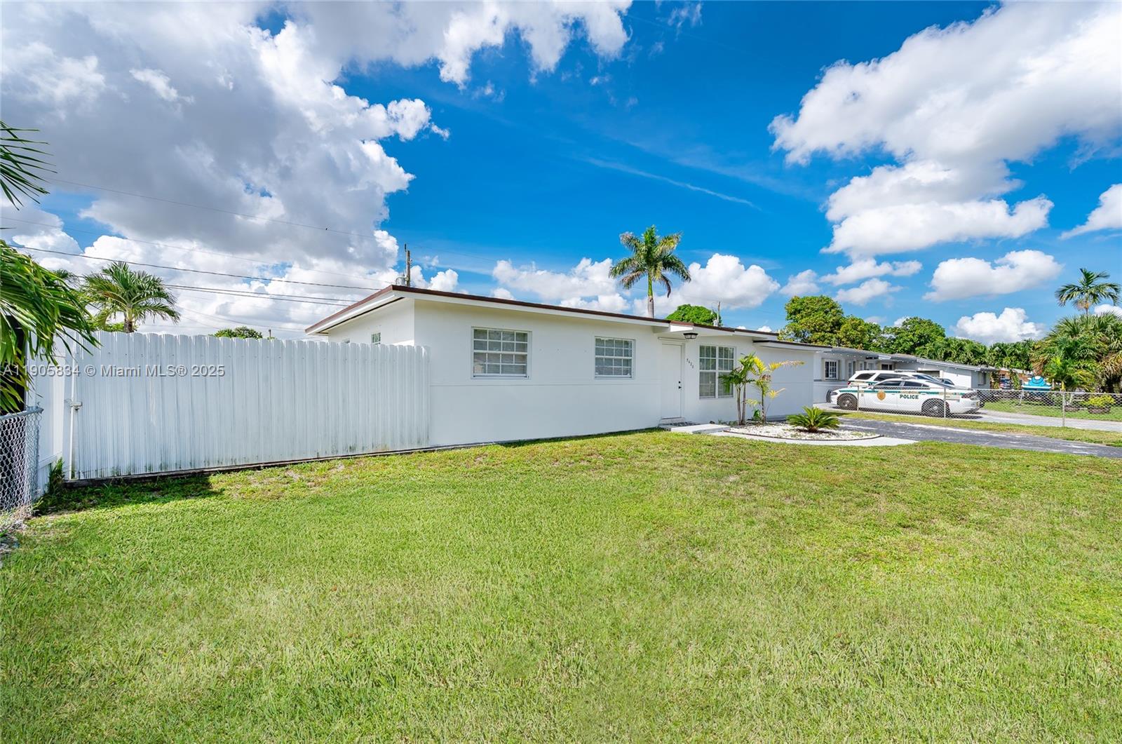 5420 Northwest 182nd Street Miami Gardens, FL 33055 - Photo 4 of 35 a view of a house with a yard