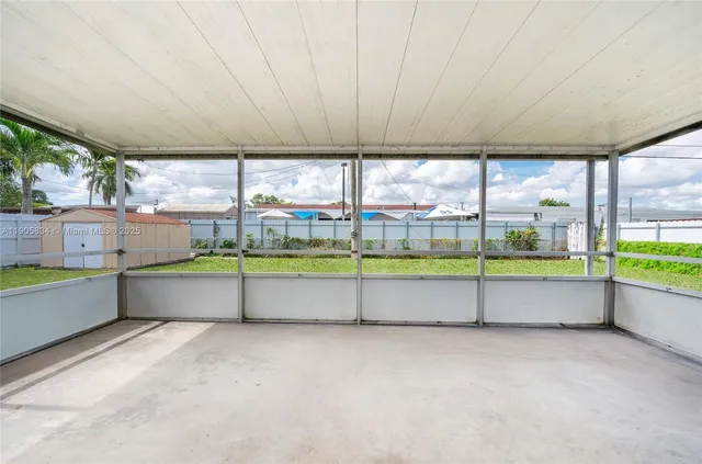 a large swimming pool with a outdoor seating