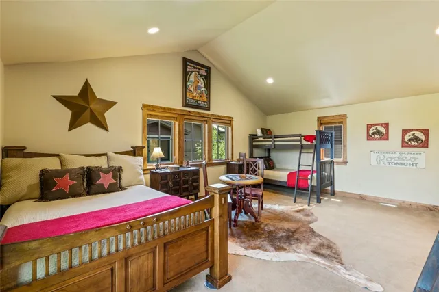 a bedroom with furniture and a bed