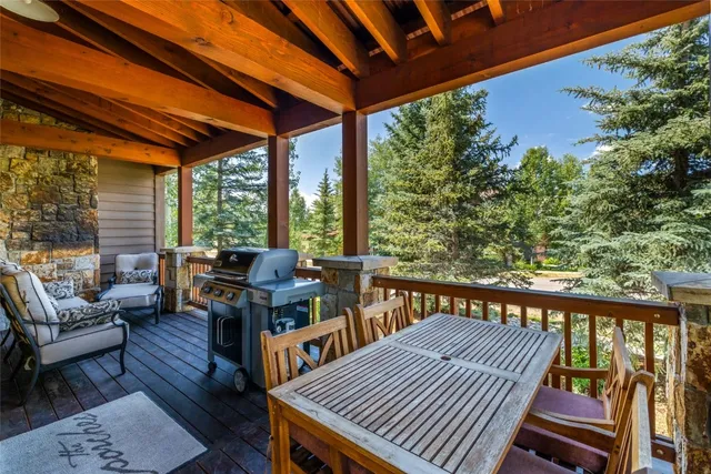a view of a patio with wooden floor