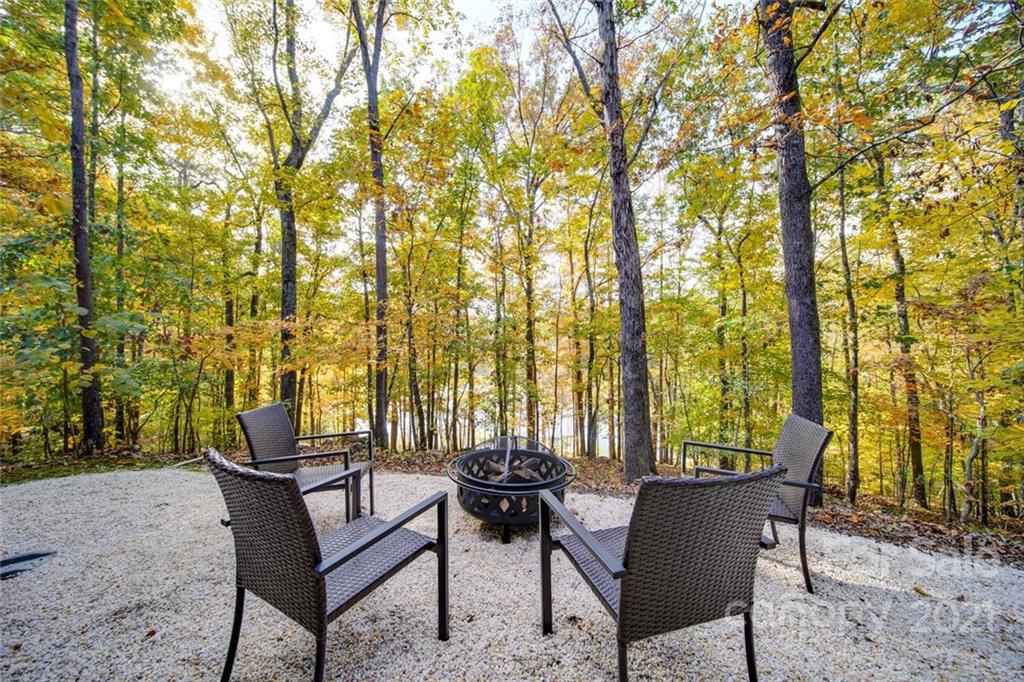 105 Den Road Wadesboro, NC 28170 - Photo 11 of 47 a view of a chairs and table in the patio