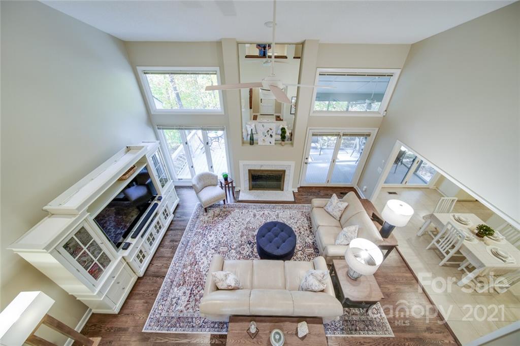 105 Den Road Wadesboro, NC 28170 - Photo 20 of 47 a living room with furniture a fireplace and a flat screen tv