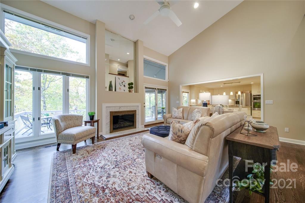 105 Den Road Wadesboro, NC 28170 - Photo 21 of 47 a living room with furniture fireplace and a large window