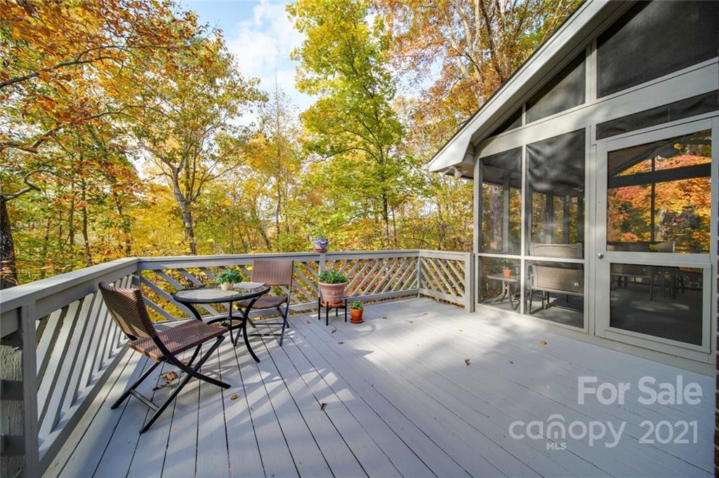105 Den Road Wadesboro, NC 28170 - Photo 24 of 47 a view of a chairs and table on the wooden deck