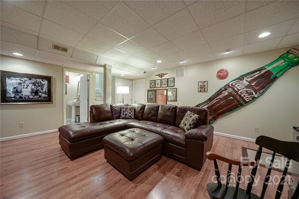 105 Den Road Wadesboro, NC 28170 - Photo 41 of 47 a living room with furniture and a wooden floor