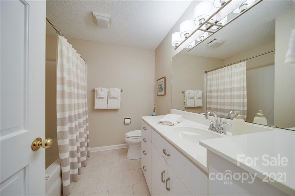 105 Den Road Wadesboro, NC 28170 - Photo 47 of 47 a bathroom with a double vanity sink toilet and shower