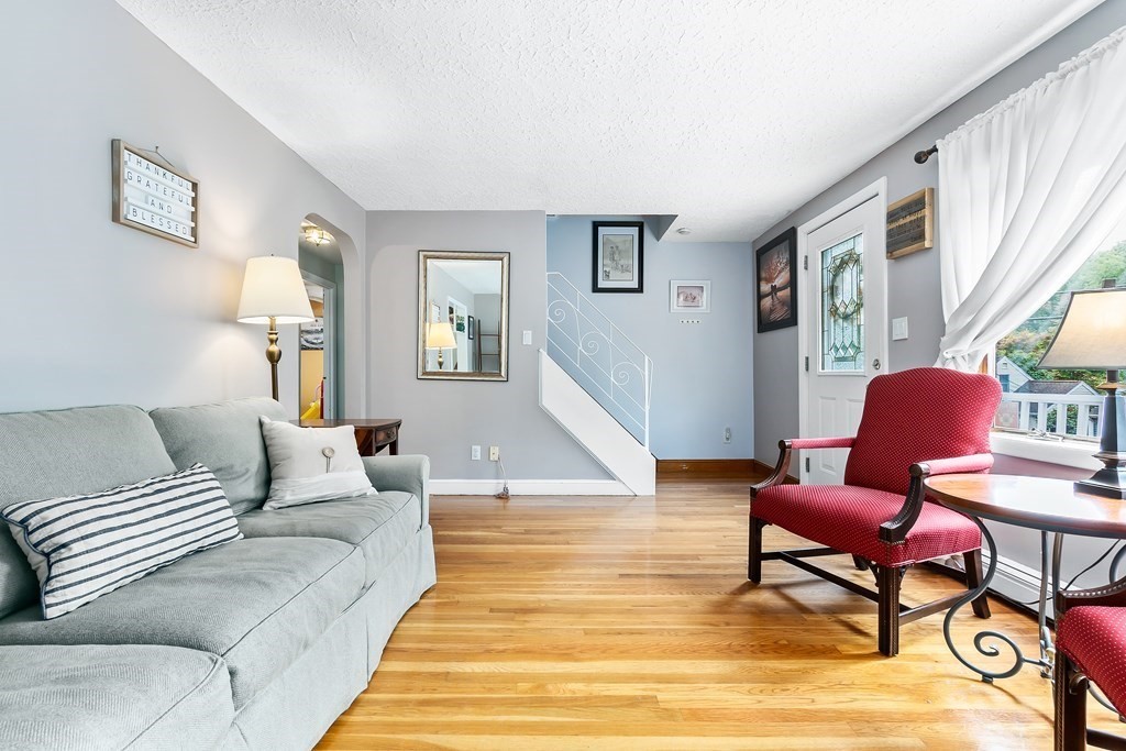 195 Den Quarry Road Lynn, MA 01904 - Photo 3 of 28 a living room with furniture and a wooden floor