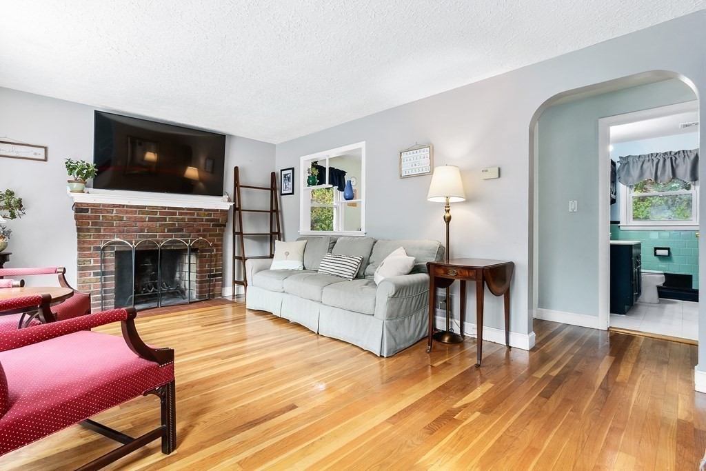 195 Den Quarry Road Lynn, MA 01904 - Photo 6 of 28 a living room with furniture and a fireplace