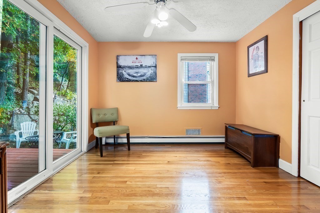 195 Den Quarry Road Lynn, MA 01904 - Photo 7 of 28 a view of a livingroom with furniture wooden floor and a window