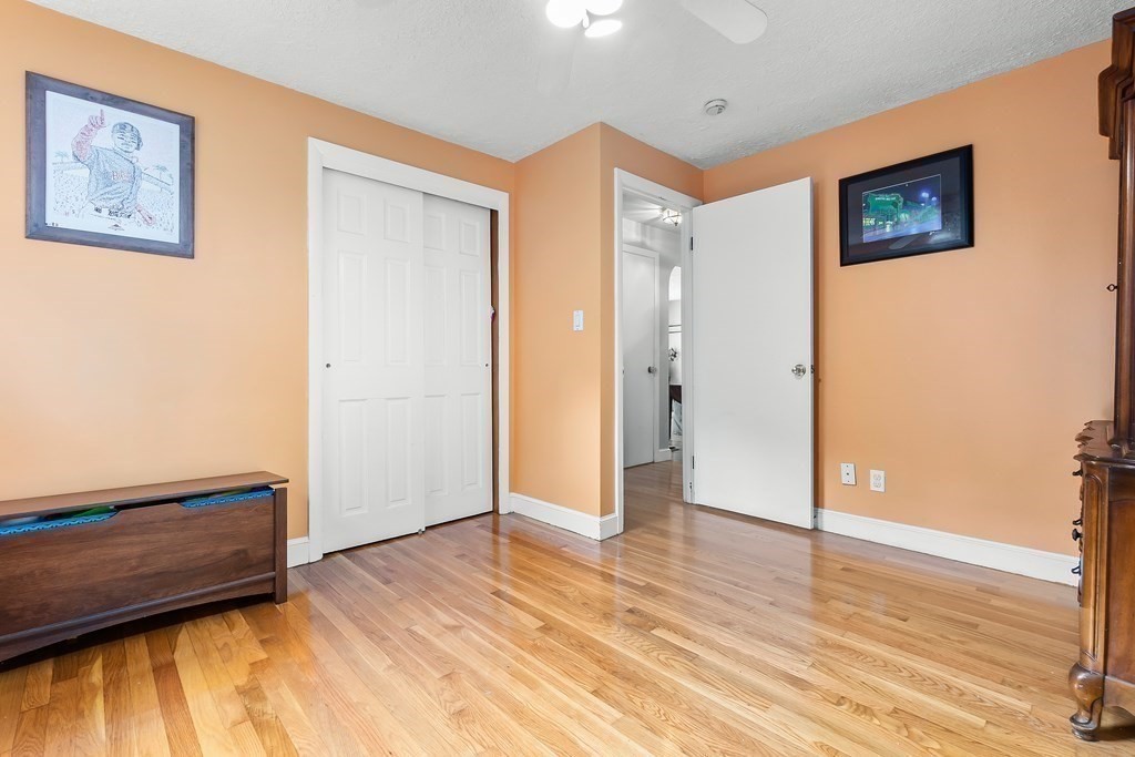 195 Den Quarry Road Lynn, MA 01904 - Photo 8 of 28 a view of an empty room with wooden floor