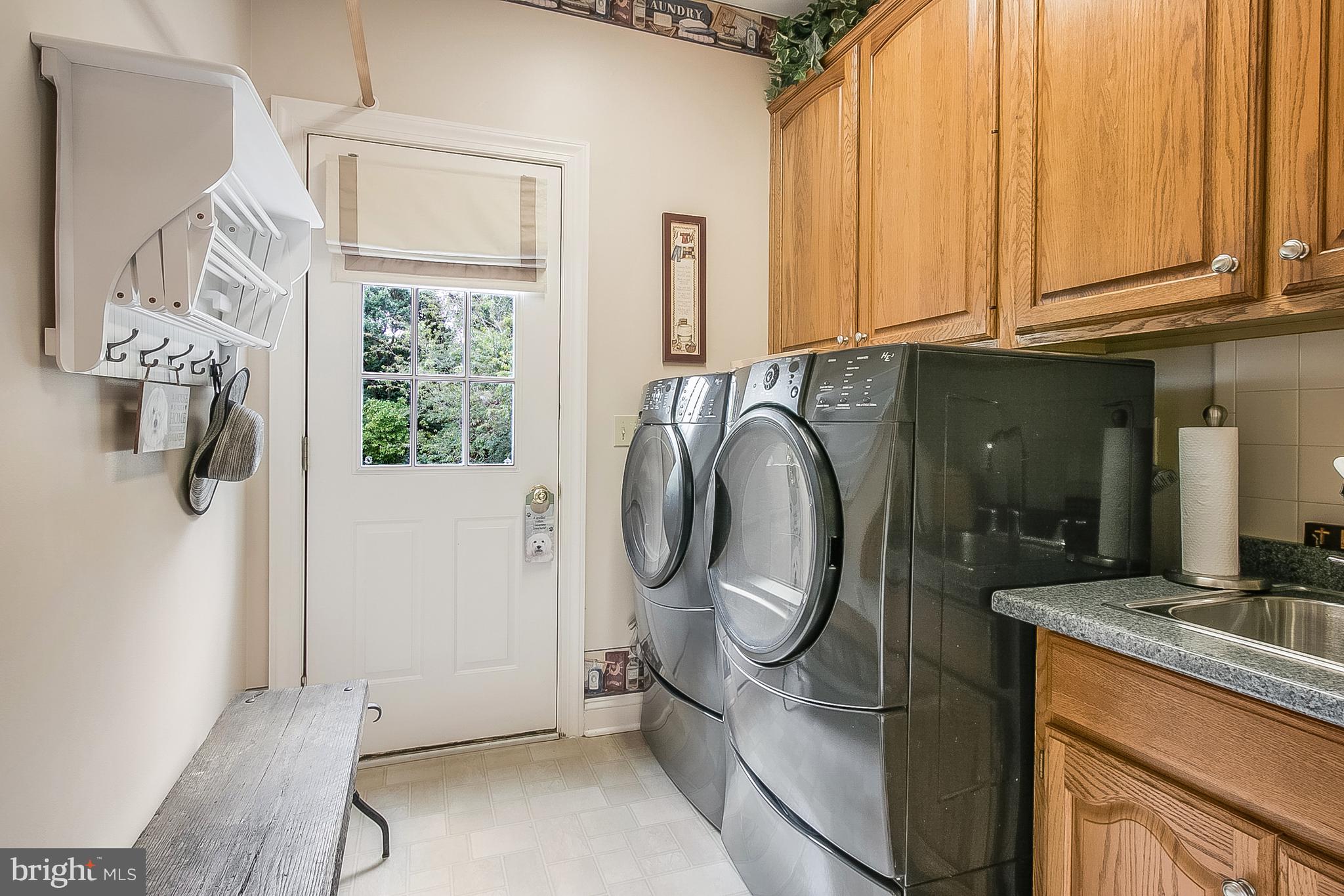 525 Ridgeview Drive Hockessin, DE 19707 - Photo 21 of 57 Lovely Laundry Room with Door to Exterior
