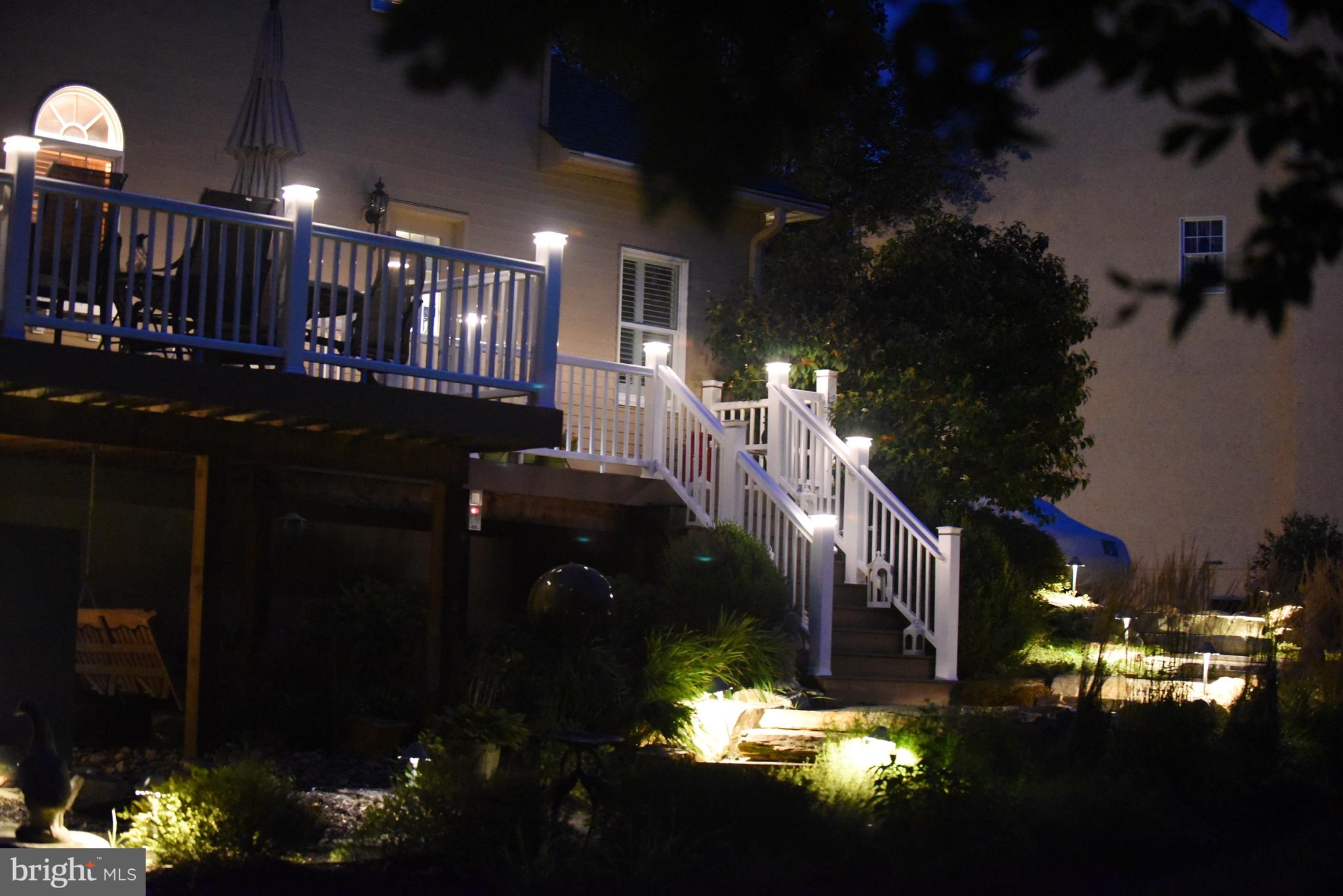 525 Ridgeview Drive Hockessin, DE 19707 - Photo 51 of 57 View of Deck at Night With Lighted Posts