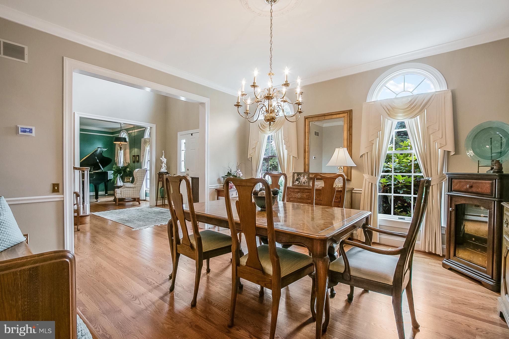 525 Ridgeview Drive Hockessin, DE 19707 - Photo 7 of 57 Another Dining Room View w/Two Circle Top Windows