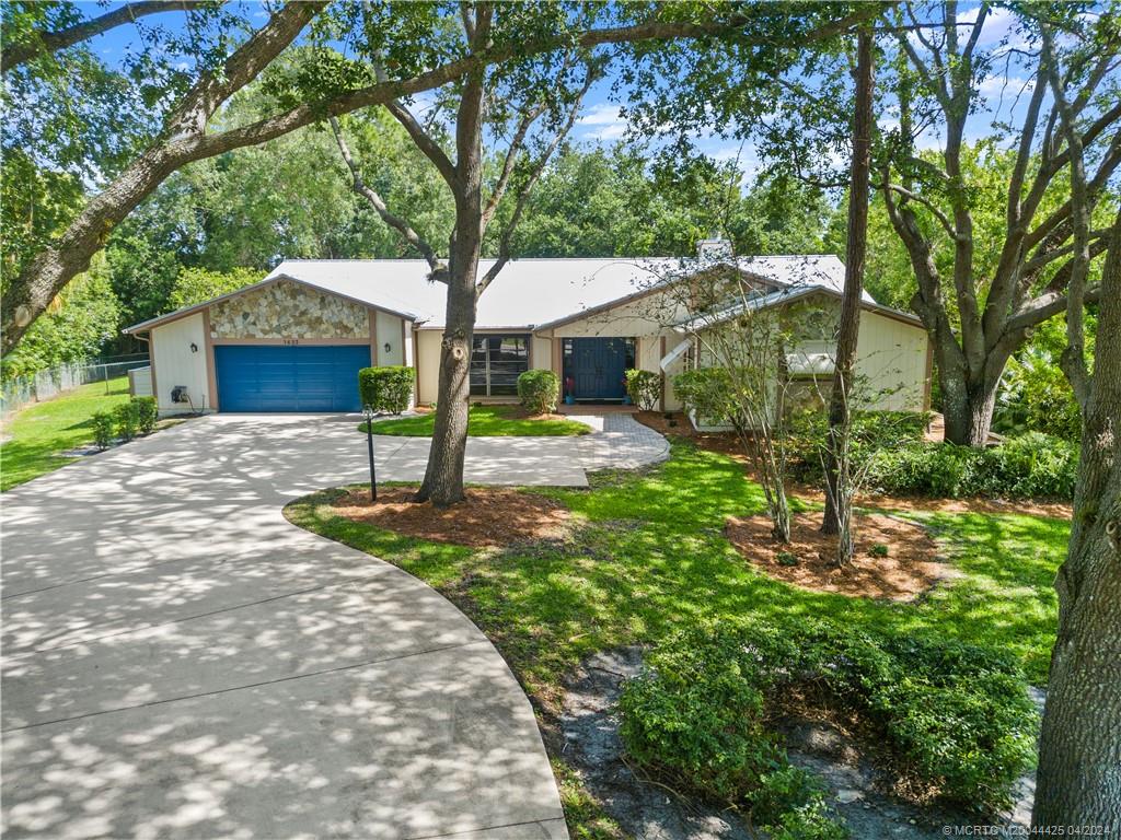 1623 Southwest Gregor Way Stuart, FL 34997 - Photo 1 of 42 Stunning Setting