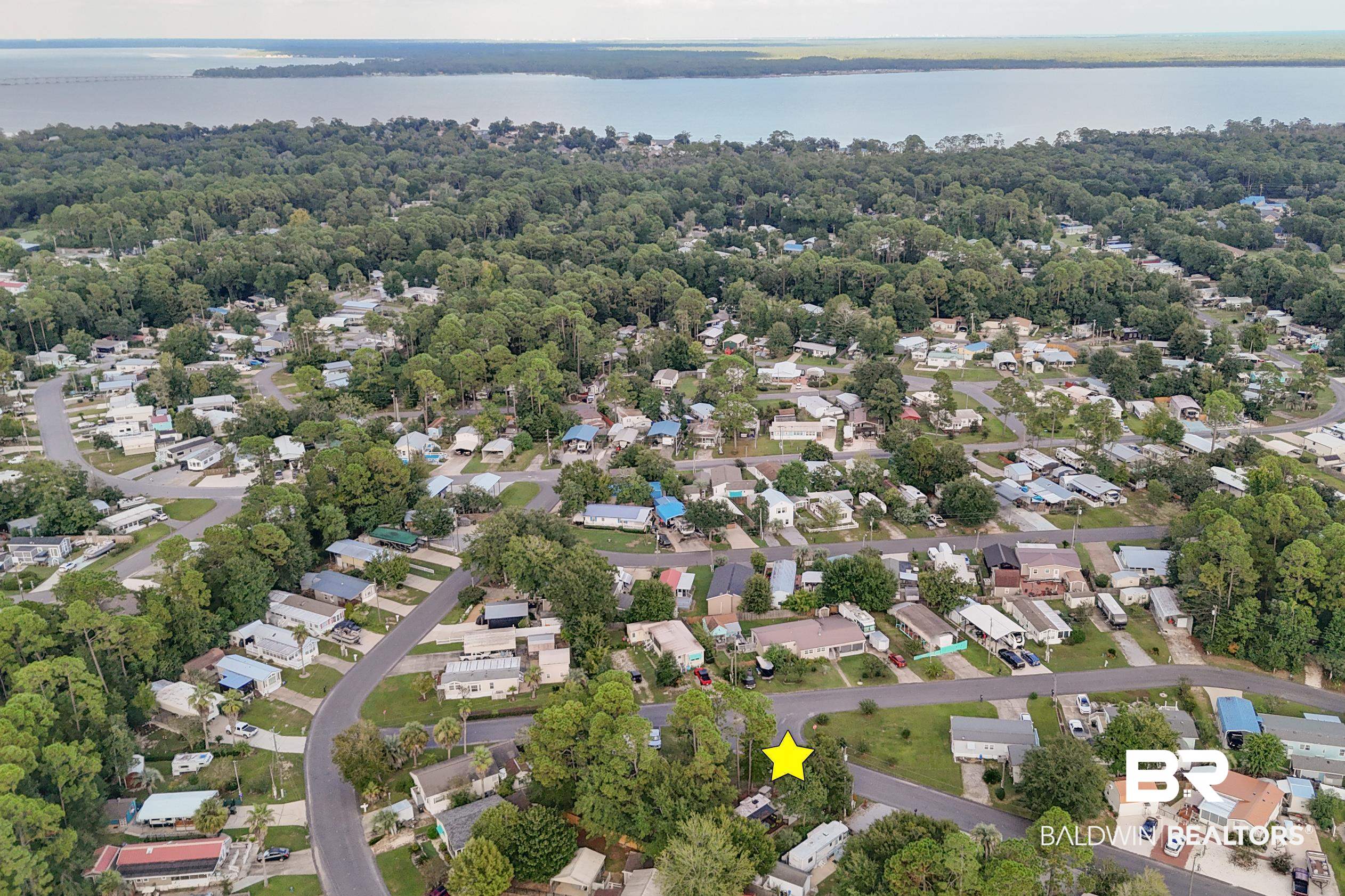 271 Defuniak Circle Lillian, AL 36549 - Photo 18 of 20 Aerial overview of property's location featuring nearby suburban area