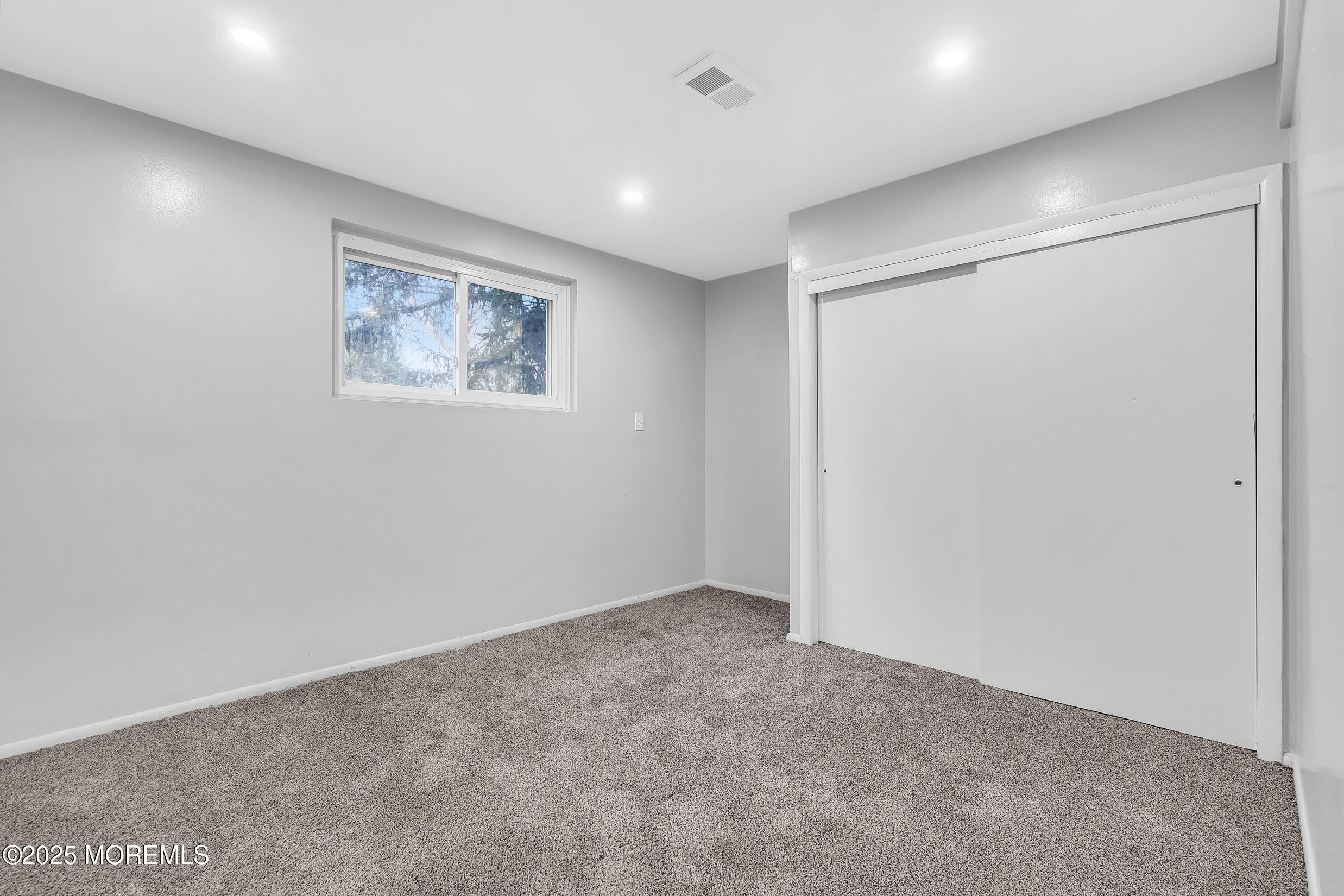 47 Beam Avenue Jackson, NJ 08527 - Photo 16 of 22 an empty room with a hallway