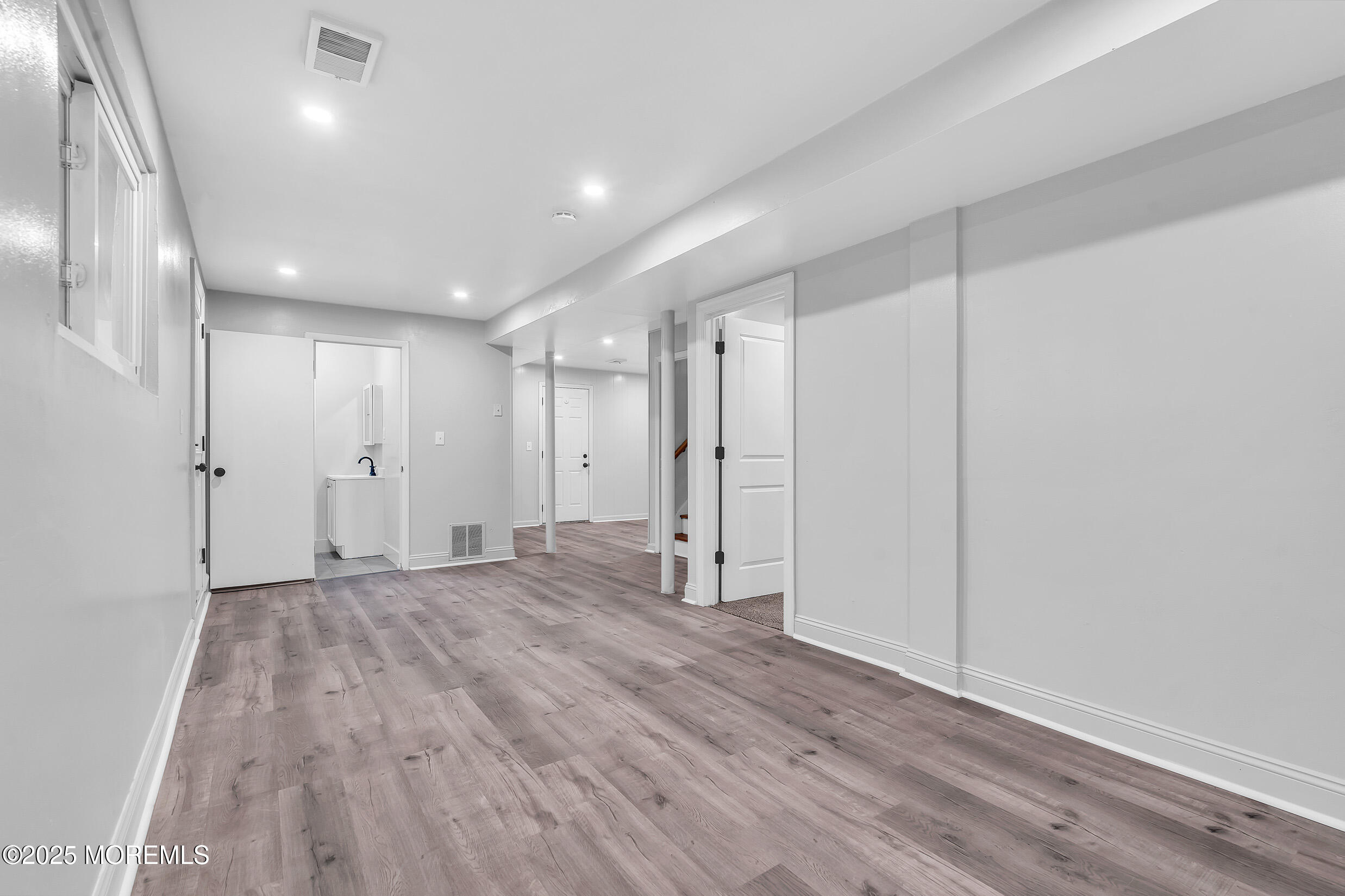 47 Beam Avenue Jackson, NJ 08527 - Photo 17 of 22 a view of empty room with wooden floor