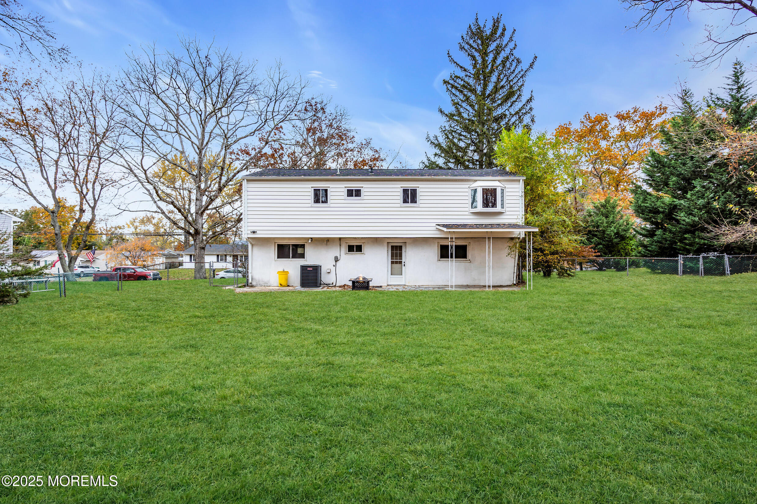 47 Beam Avenue Jackson, NJ 08527 - Photo 22 of 22 a view of a big house with a big yard plants and large trees