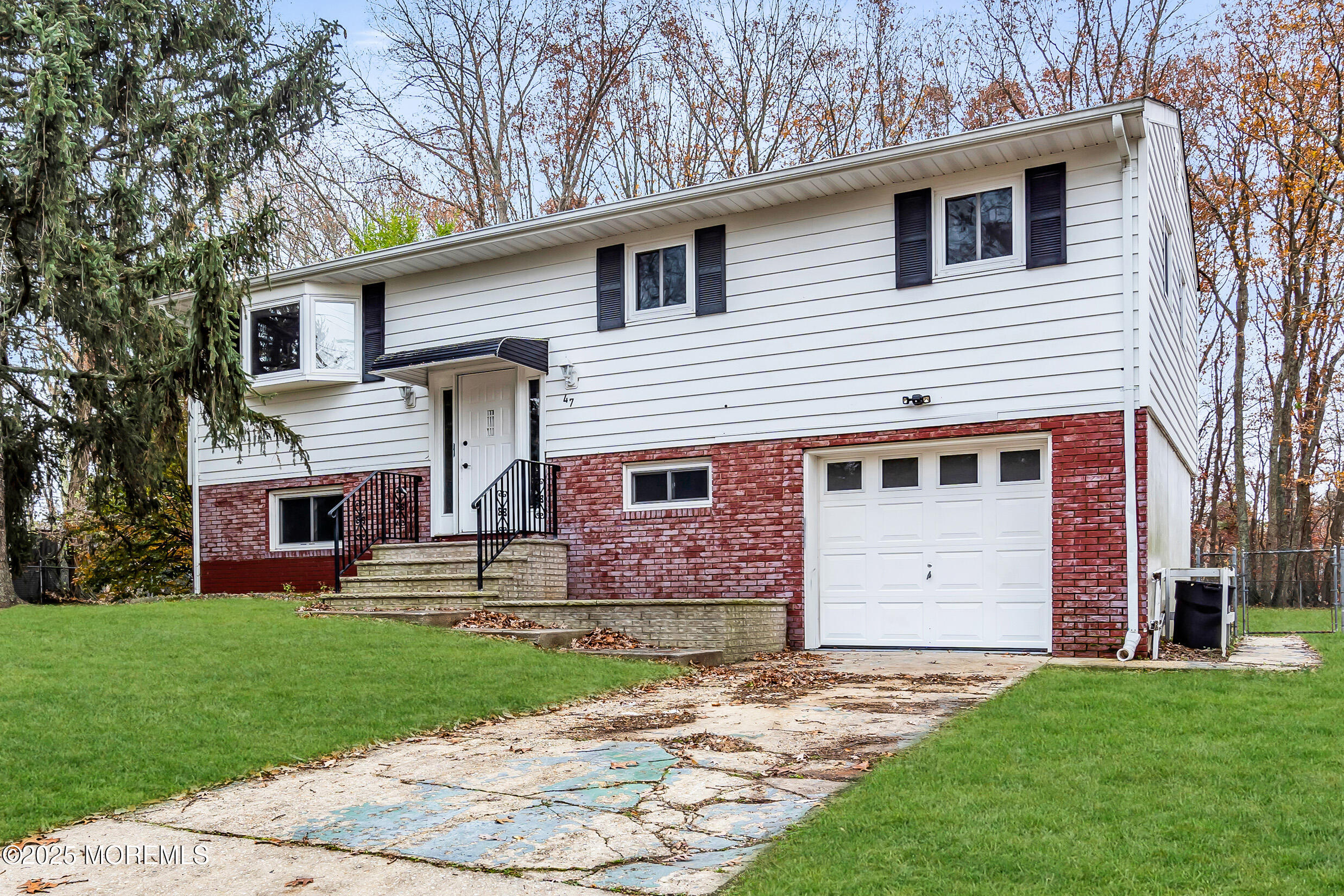 47 Beam Avenue Jackson, NJ 08527 - Photo 4 of 22 a front view of house with a garden