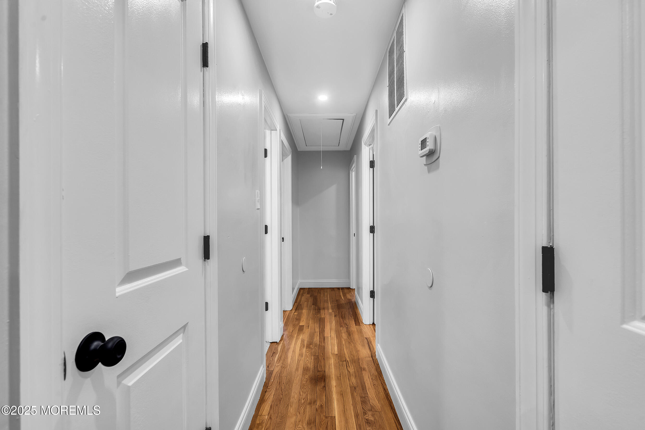 47 Beam Avenue Jackson, NJ 08527 - Photo 9 of 22 a view of a hallway with wooden floor