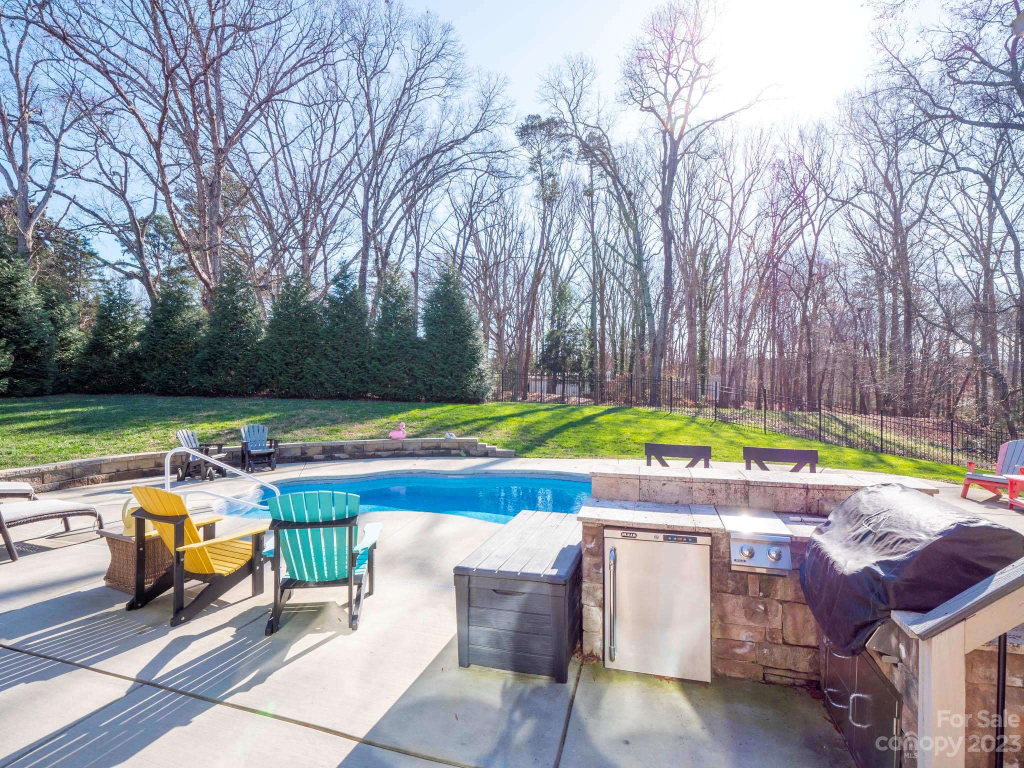 4226 Morris Park Drive, Unit 2 Mint Hill, NC 28227 - Photo 12 of 48 an outdoor space with swimming pool and furniture