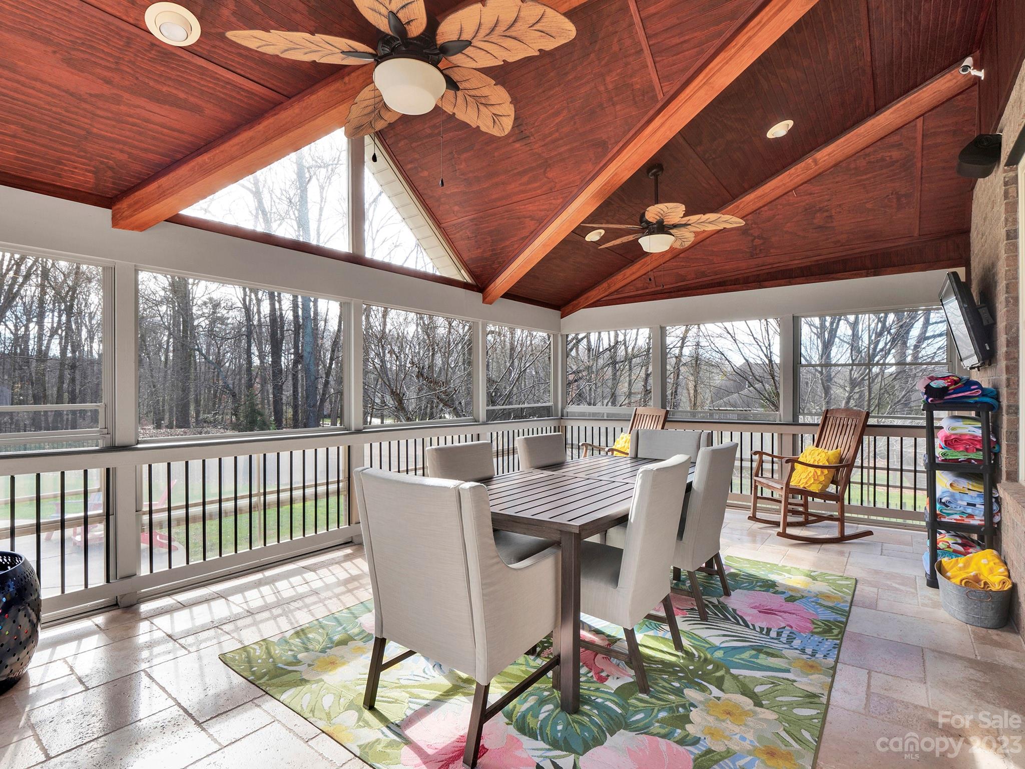4226 Morris Park Drive, Unit 2 Mint Hill, NC 28227 - Photo 13 of 48 a dining room with furniture a chandelier and a rug