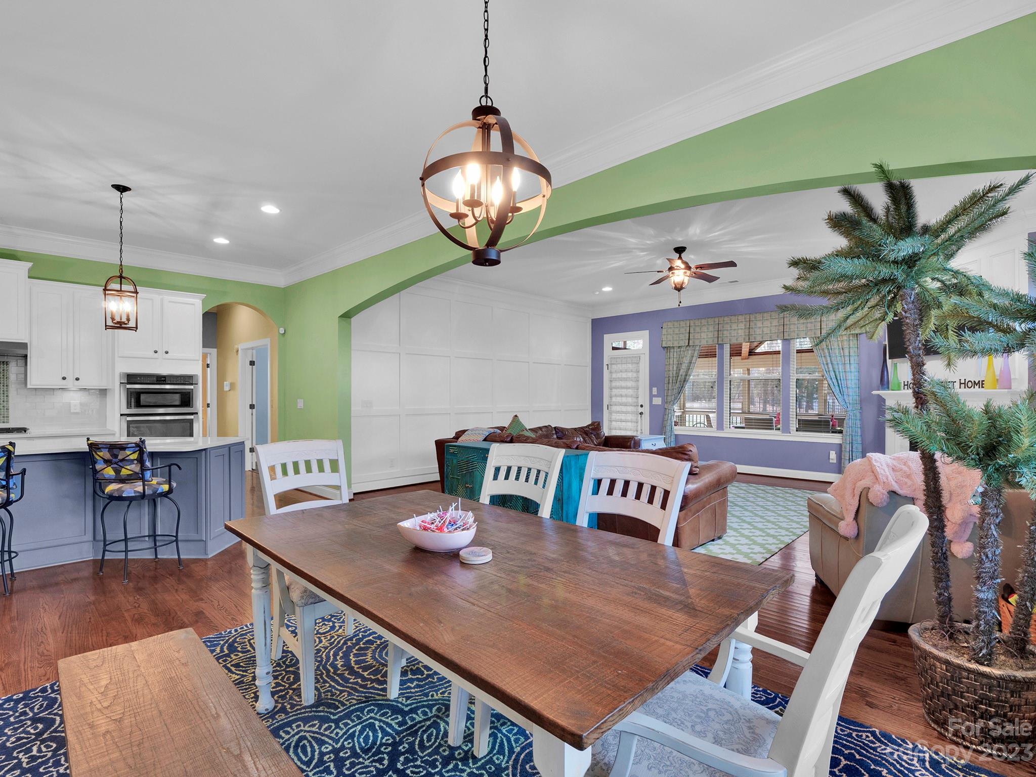 4226 Morris Park Drive, Unit 2 Mint Hill, NC 28227 - Photo 31 of 48 a view of a dining room with furniture wooden floor and chandelier