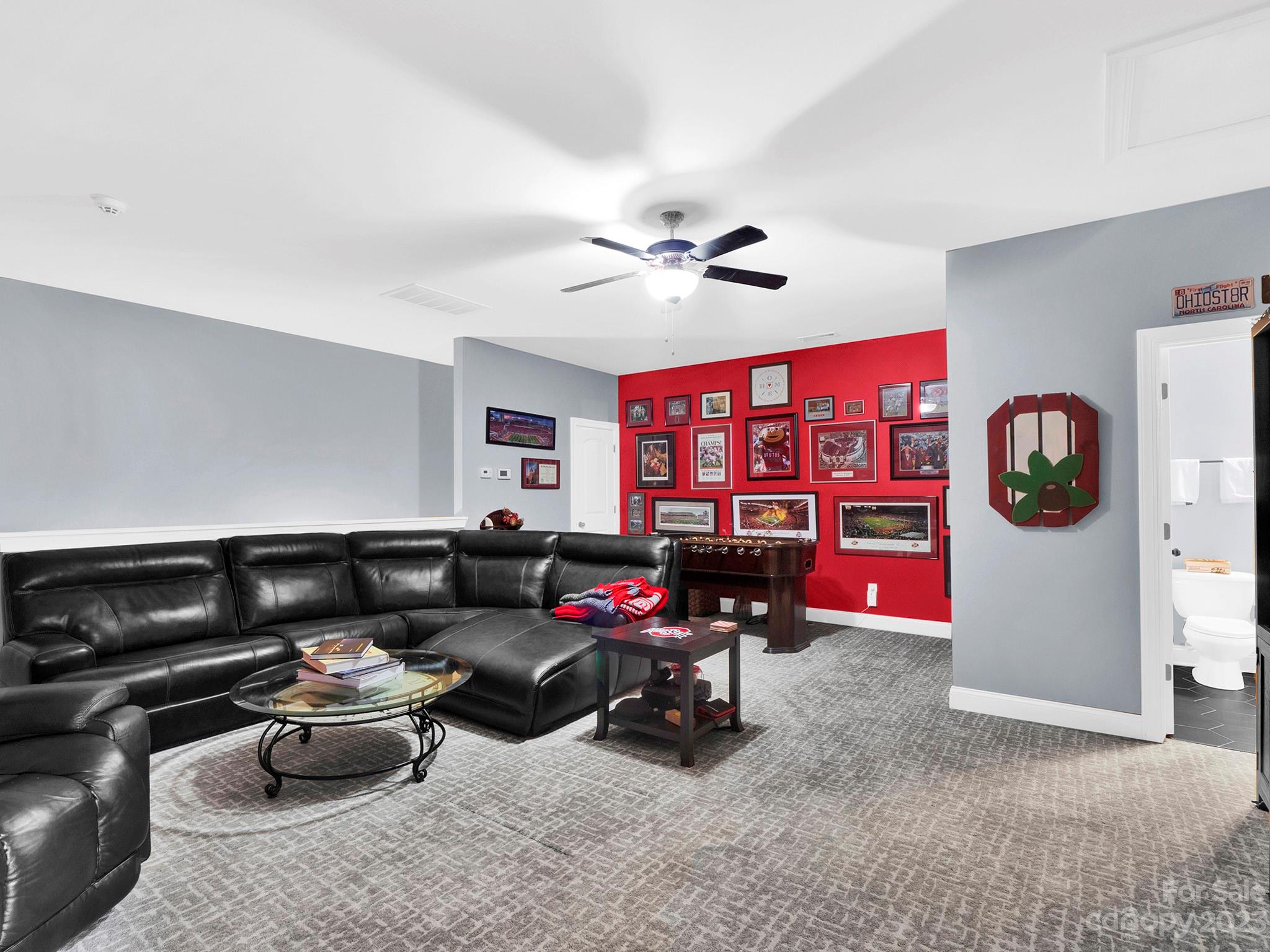 4226 Morris Park Drive, Unit 2 Mint Hill, NC 28227 - Photo 45 of 48 a living room with furniture and a flat screen tv