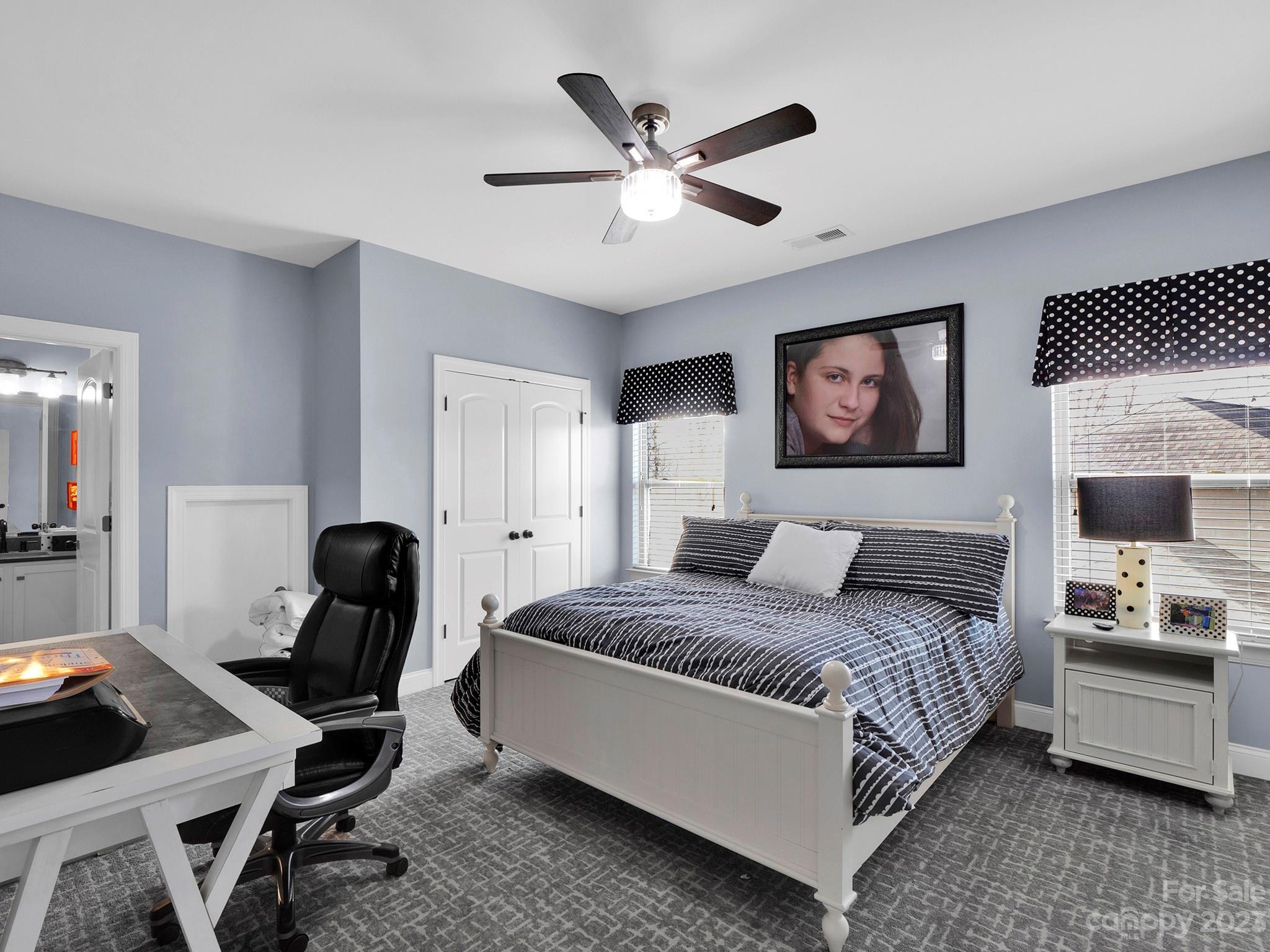 4226 Morris Park Drive, Unit 2 Mint Hill, NC 28227 - Photo 46 of 48 a bedroom with a bed and a desk