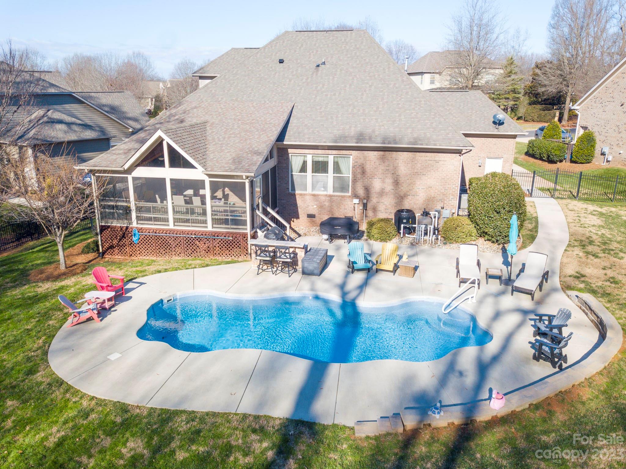 4226 Morris Park Drive, Unit 2 Mint Hill, NC 28227 - Photo 9 of 48 a view of a house with a swimming pool