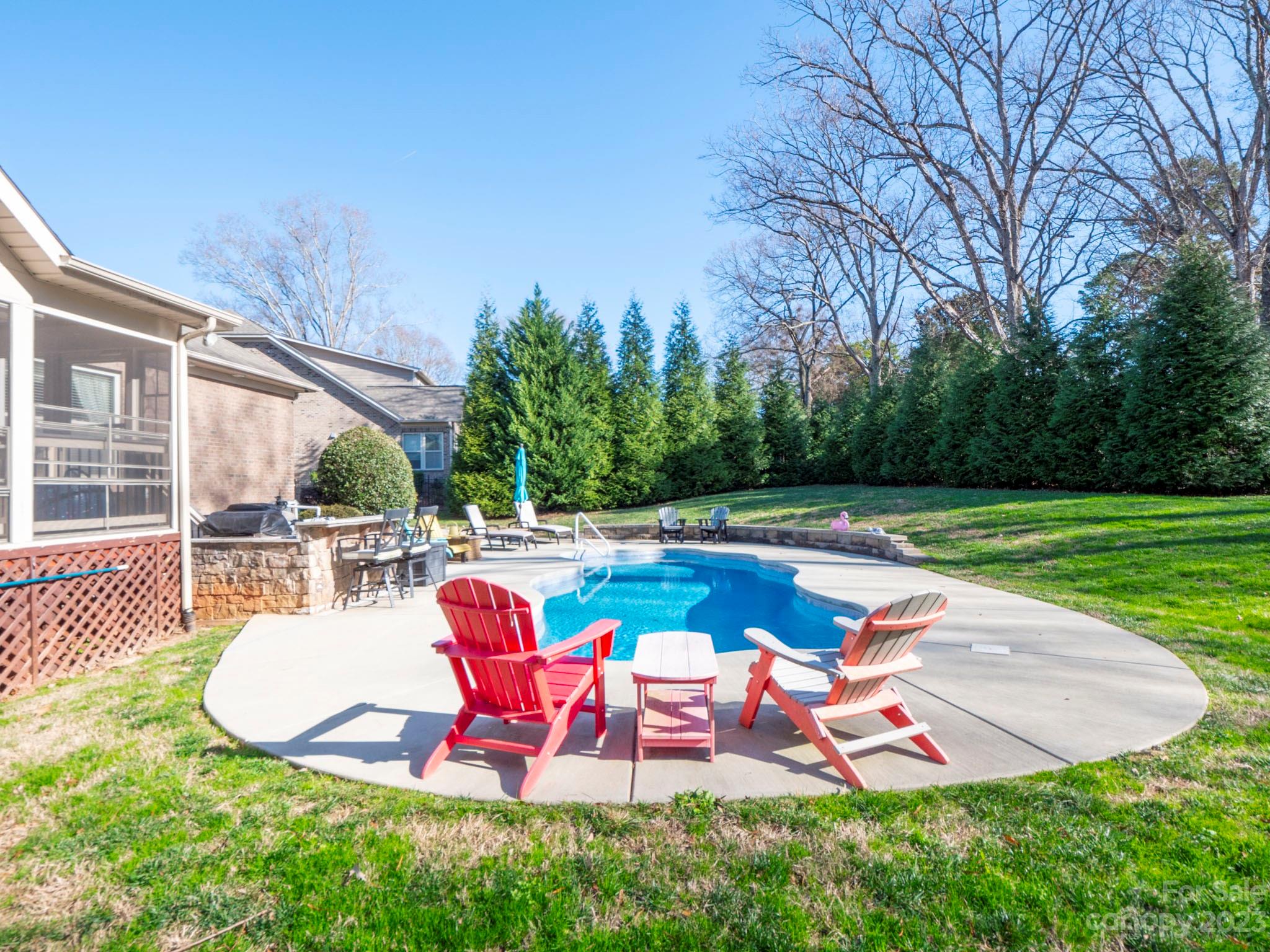 4226 Morris Park Drive, Unit 2 Mint Hill, NC 28227 - Photo 10 of 48 a view of a swimming pool with a patio