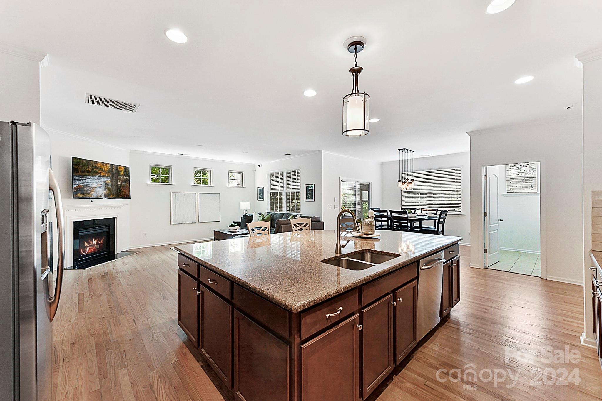 1201 Screech Owl Road Waxhaw, NC 28173 - Photo 14 of 43 a kitchen with sink stove and refrigerator