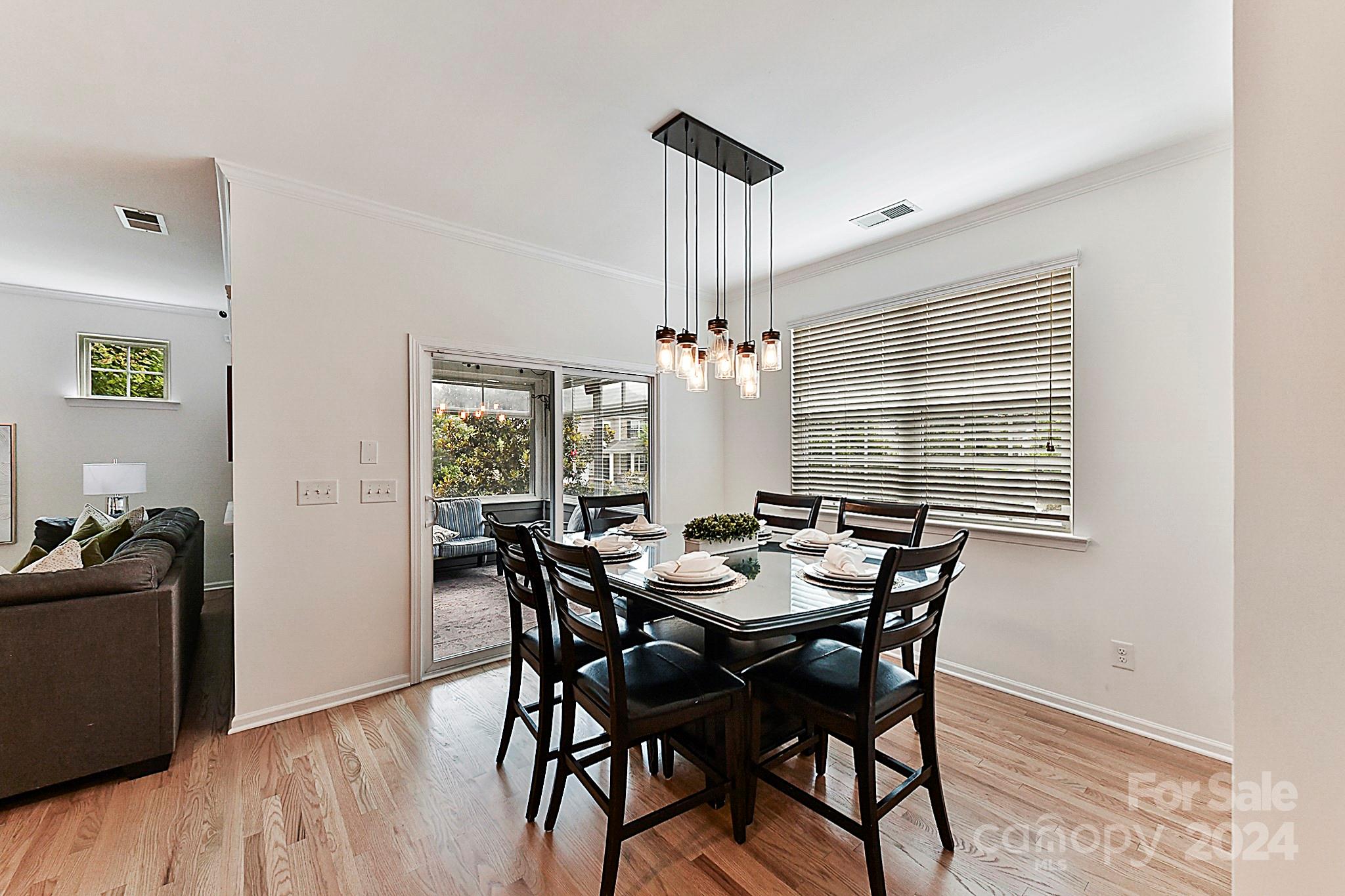1201 Screech Owl Road Waxhaw, NC 28173 - Photo 15 of 43 a view of a dining room with furniture and window