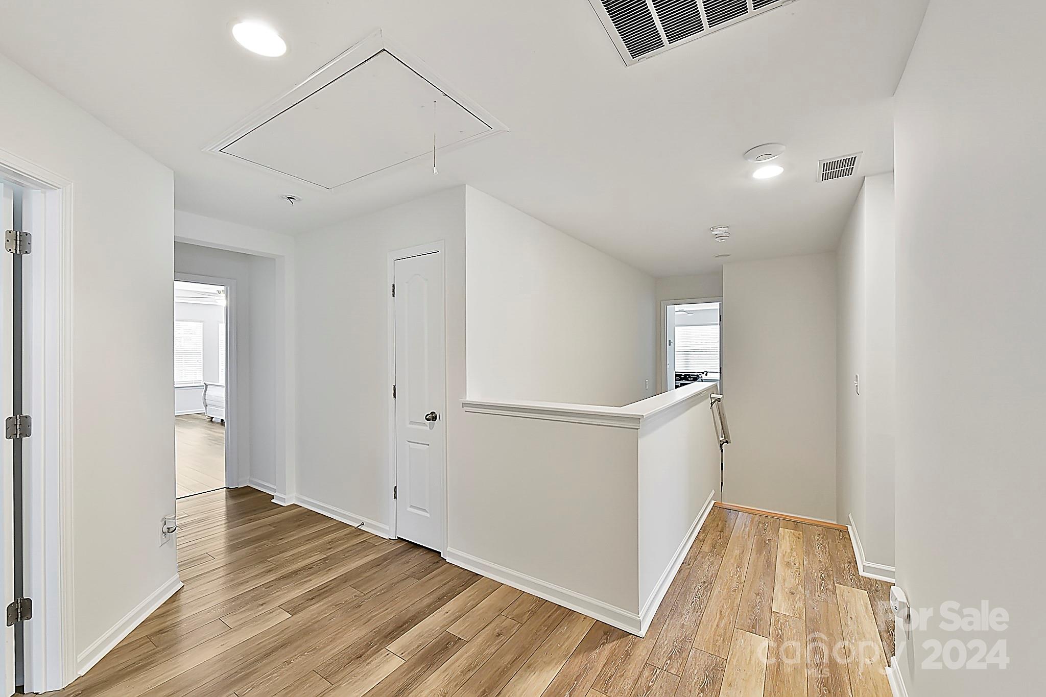 1201 Screech Owl Road Waxhaw, NC 28173 - Photo 22 of 43 a view of empty room with wooden floor