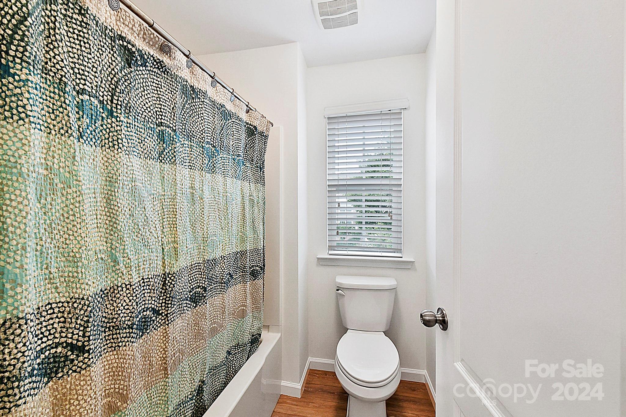 1201 Screech Owl Road Waxhaw, NC 28173 - Photo 28 of 43 a bathroom with a toilet and a shower